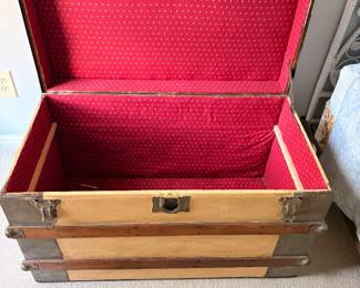 Lined antique steamer trunk