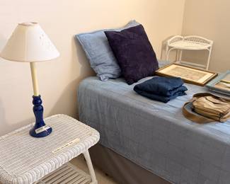 Twin bed and wicker pieces