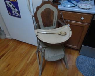 Antique Highchair with porcelain tray/added feature potty too!