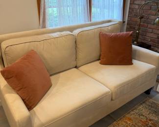 Pair of cream sofas