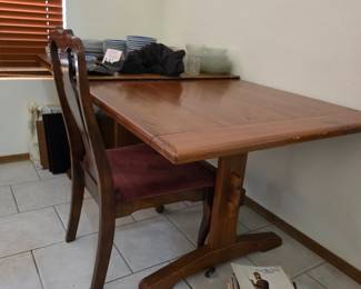 solid-wood trestle/pedestal dining table