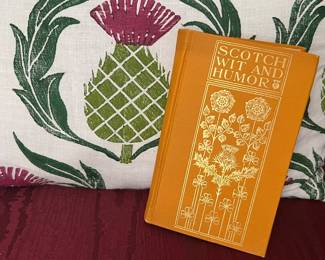 Scottish design on pillow and book of Scottish humor