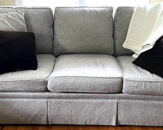 Comfortable three cushion sofa