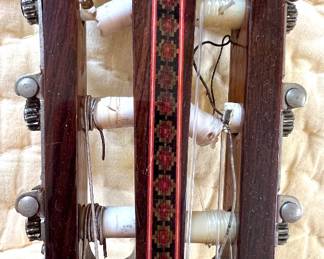 Inlaid head of the guitar