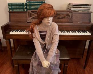Life-size female display mannequin with wig