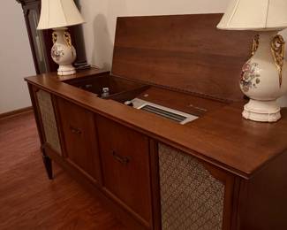 Vintage Fleetwood stereo console with built-in record player and radio