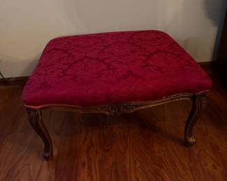French Provincial-style upholstered ottoman