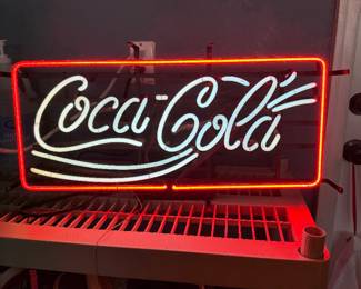 Working Coca-Cola neon advertising sign