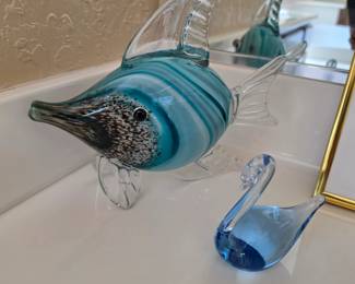 Murano-style striped art glass fish figurine and a smaller blue glass swan figurine