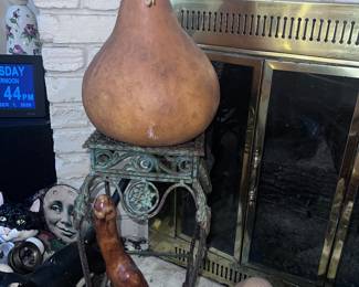 Small side table with lots of decorative collectibles