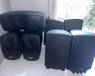 Two surround sound systems with subwoofer