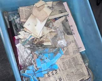 Two Rubbermaid containers, full of glass, cutting materials and tools perfect for stainless glass crafting