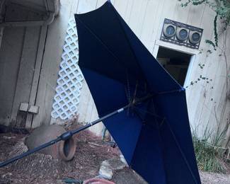 Three large outside umbrellas