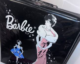 Vintage Barbie doll case with Barbies
