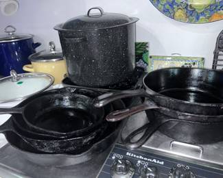 Huge collection of cast-iron pans