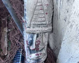 Vintage tribal concrete yard art