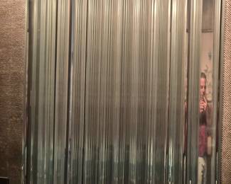 One of a pair of Glass Rod architectural features in a bathroom