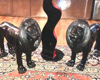Pair of bronze black patinated lions