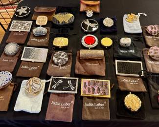 Large selection of Judith Lieber compacts