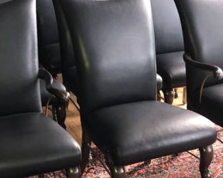 Set of 12 leather covered dining chairs