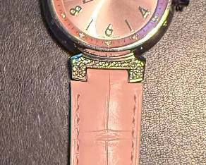 Louis Vuitton Tambour watch.