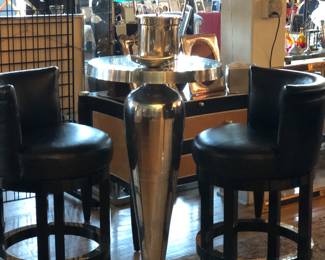 Bistro table, two leather bar chairs being sold separately from the table