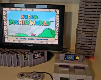 Several Super Nintendo consoles with TONS of games