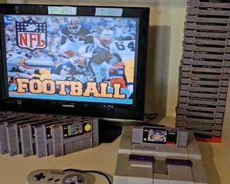 Several Super Nintendo consoles with TONS of games