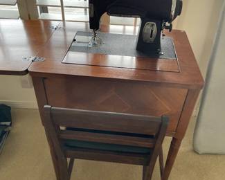 sewing machine with cabinet