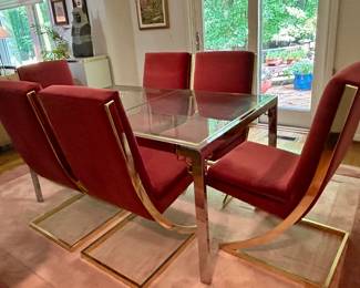 Hollywood Regency style dining set with a glass-top table and red velvet cantilever "Z" chairs