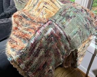 Absolutely Fabulous Throw knitted blanket designed by Peggy MacKenzie using specialty yarns from Colinette Yarns
