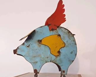 Metal folk art pig sculpture