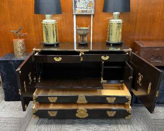 Mid to late 20th century bar cabinet. Double doors open to shelves, drawers, and closed cabinets