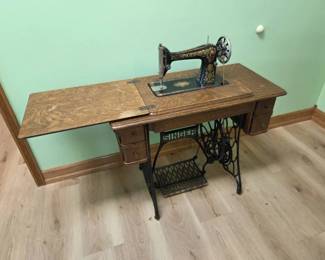Antique Singer Treadle Sewing Machine in Oak Cabinet