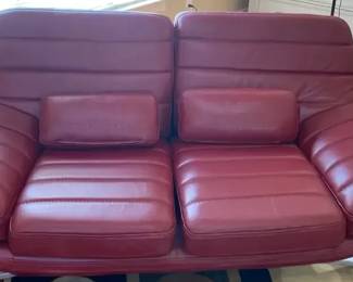 Red Leather Loveseat With Channeled Cushions And Curved Silver Metal Legs