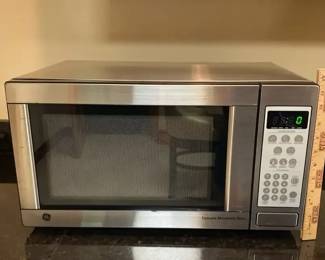 GE Microwave With Turn Table Spice Rack And Paper towels Holder