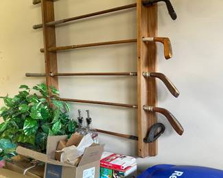 Antique Golf Clubs in Rack