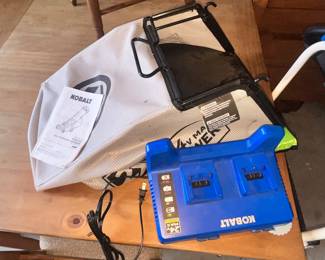 HAS CHARGER, MANUAL & CATCHER BAG