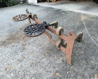 Unusual fireplace dog iron 