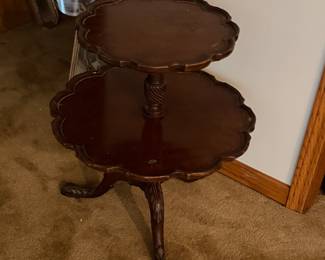 Vintage 2-tier mahogany pie crust table, often traditionally referred to as a dumbwaiter table or butler's tea table.