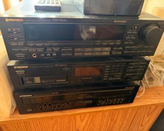 Top Component: Pioneer VSX-5300 – An Audio/Video Stereo Receiver featuring Dolby Surround sound.Middle Component: Pioneer PD-M500 – A 6-disc multi-play Compact Disc (CD) changer player.Bottom Component: Pioneer GR-555 – A 7-band stereo graphic equalizer used to fine-tune audio frequencies.