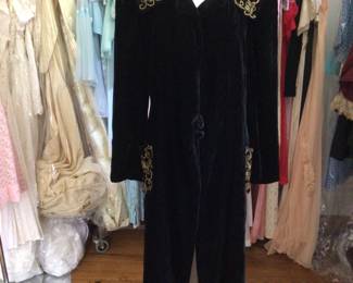 1940s black velvet robe with gold embroidered surface design and rhinestones. Studio room