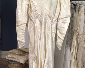 early 1940s wedding dress with surface design. Studio room.