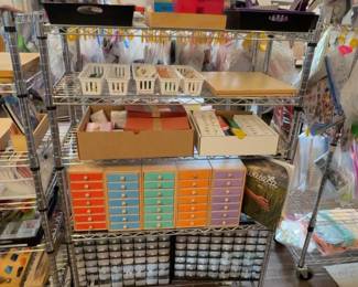 LE025 Full wire rack with colorcoded numbered drawer cabinets lesson baskets and smallparts organizers