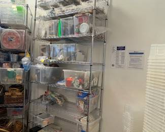 TS009 Tall chrome wire shelving unit with assorted clear bins of teachingcraft materials