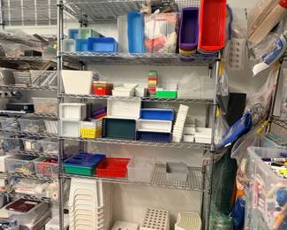 TS023 Full wire shelving unit of assorted trays baskets and step stools