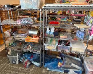 LE006 Wire shelving loaded with boxedbagged Montessori lessons and classroom materials