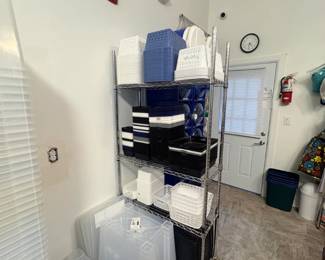TS007 Stacks of white and clear classroom bins plus rolling wire storage shelf
