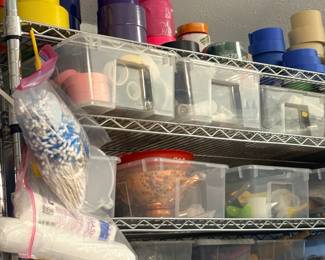TS025 Practicallife shelf with colorful tape rolls pitcherscups cotton balls and assorted containers