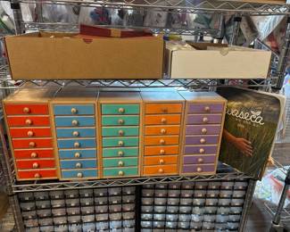 LE023 Five colorcoded wooden drawer cabinets with numbered drawers two smallparts organizers below